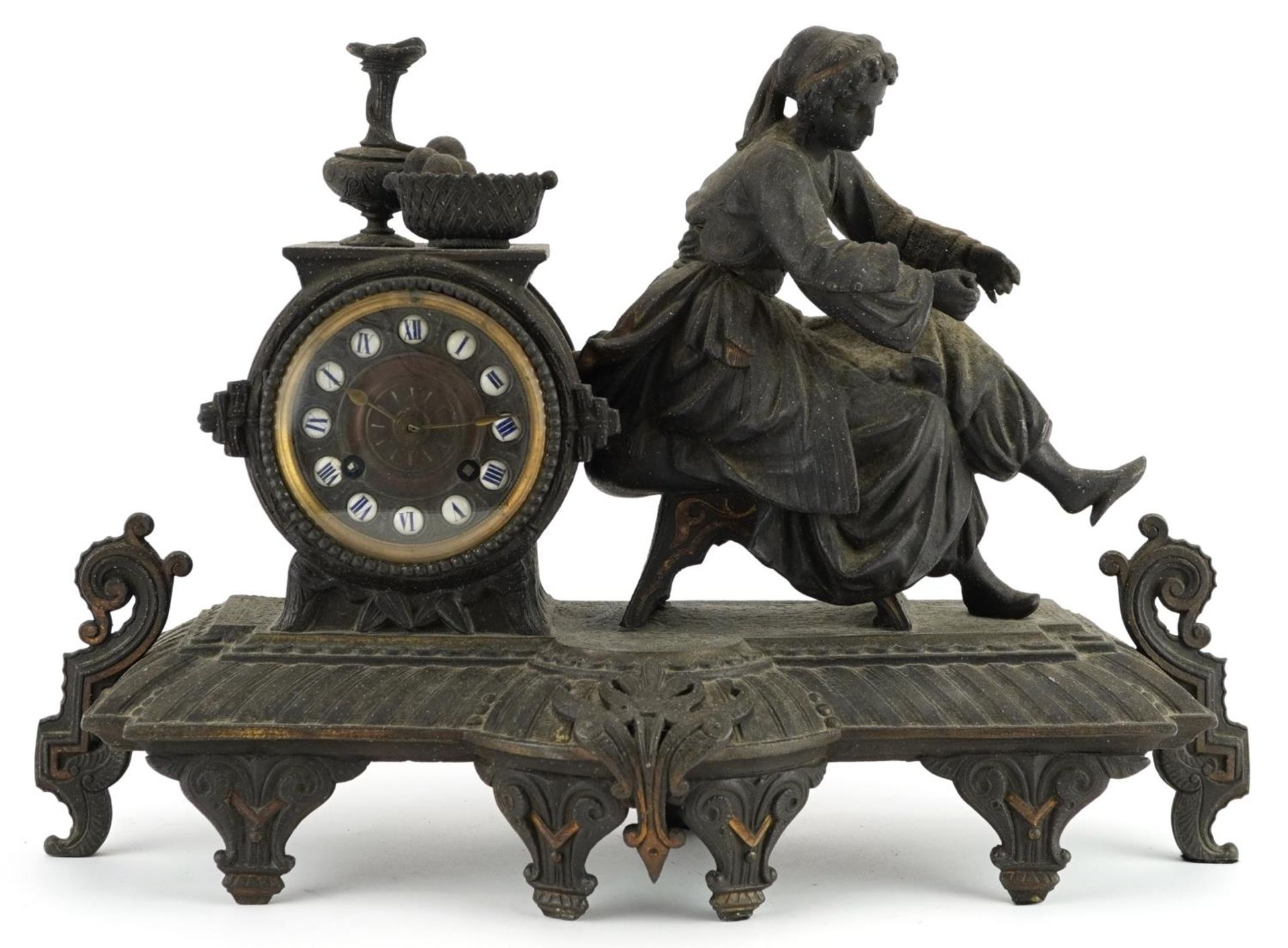 19th century partially gilt patinated spelter figural mantle clock striking on a bell with
