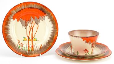 Clarice Cliff, Art Deco Honeyglaze conical teaware hand painted in the Taormina pattern comprising