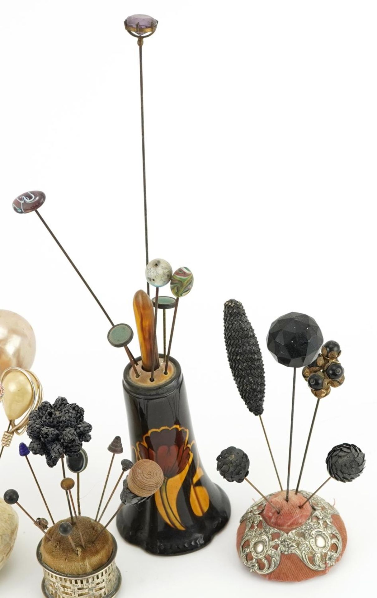 Collection of early 20th century and later hatpins arranged in four hatpin stands including two - Image 3 of 4
