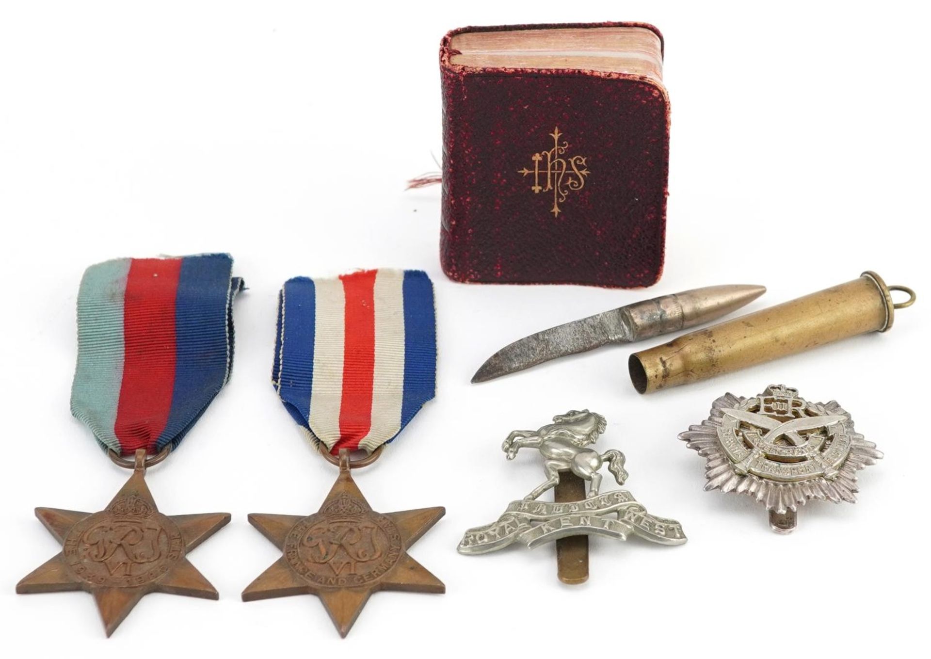 British militaria comprising two World War II medals, trench art bullet knife, Gurkha Transport