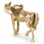 9ct gold charm in the form of a standing horse, 2.4cm in length, 7.8g