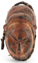 African tribal interest lacquered carved hardwood face mask, 28cm high