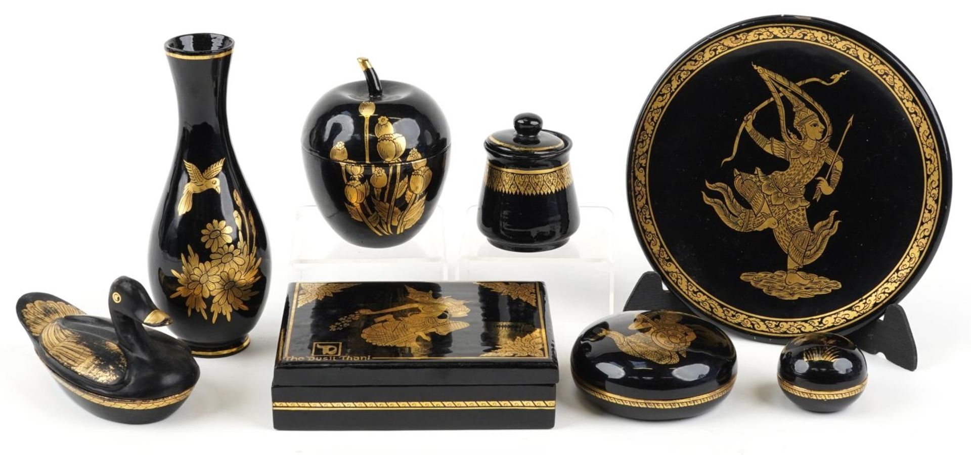 Burmese black lacquer including a rectangular box with lift off lid gilded with a deity and a