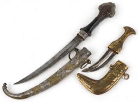 Two Islamic knives including one with silver overlaid brass sheath, 40.5cm in length