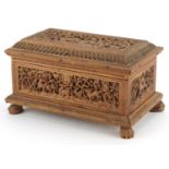 Good Anglo Indian sandalwood wood table casket with lift off lid and paw feet profusely carved