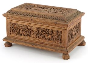 Good Anglo Indian sandalwood wood table casket with lift off lid and paw feet profusely carved