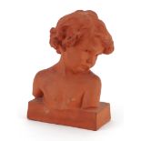Mid century style terracotta bust of a young child incised J Camus to the reverse, 22.5cm high