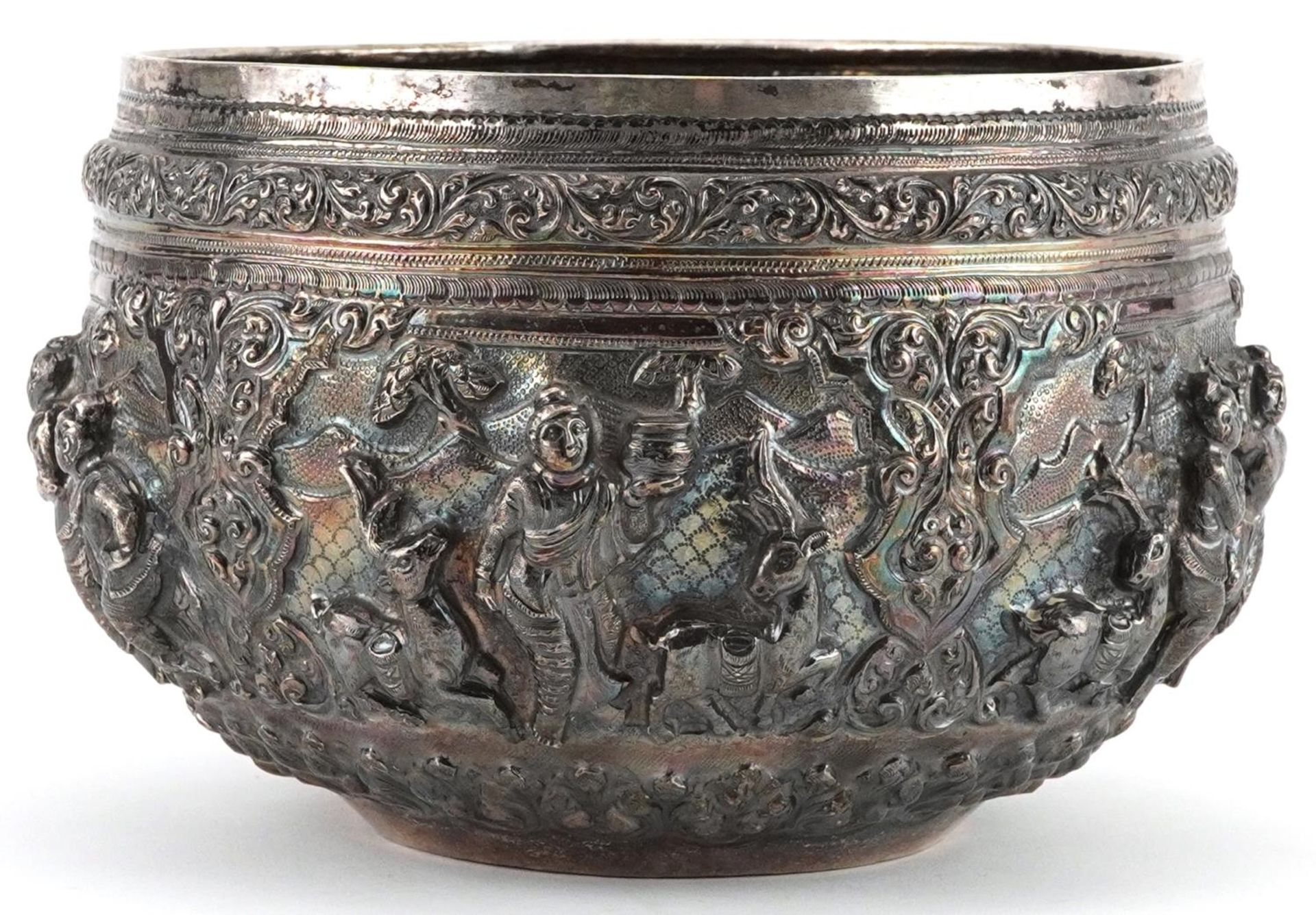 Burmese unmarked silver bowl profusely embossed with deities and animals within landscapes, 12cm - Image 6 of 10