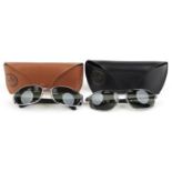 Two pairs of Ray-Ban sunglasses with cases