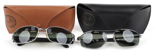 Two pairs of Ray-Ban sunglasses with cases