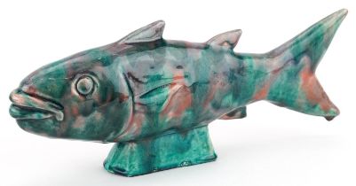 Katie Malone, large mid century style pottery fish having a mottled green, blue and red glaze,