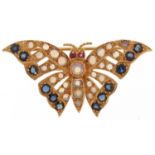 9ct gold multi gem brooch in the form of a butterfly set with sapphires, rubies and opals, 4cm wide,