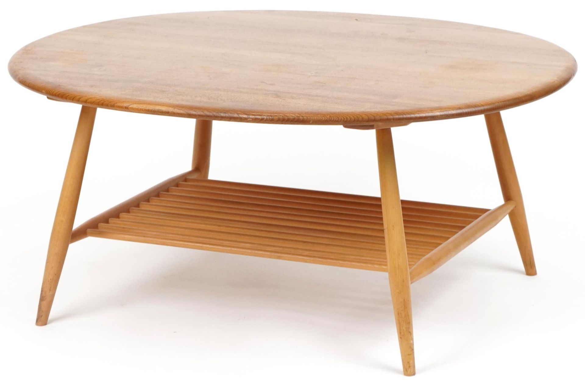 Ercol light elm coffee table with oval top, 44cm H x 99cm W x 82cm D