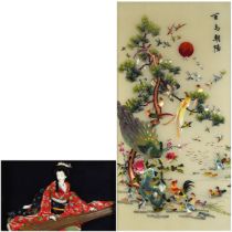 Chinese silk panel embroidered with birds of paradise amongst a tree and a framed doll, the