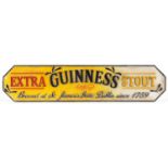 Guinness Extra Stout painted cast iron advertising wall plaque, 56.5cm x 12.5cm