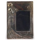 Elizabeth II rectangular silver easel photo frame embossed with an Art Nouveau female playing a