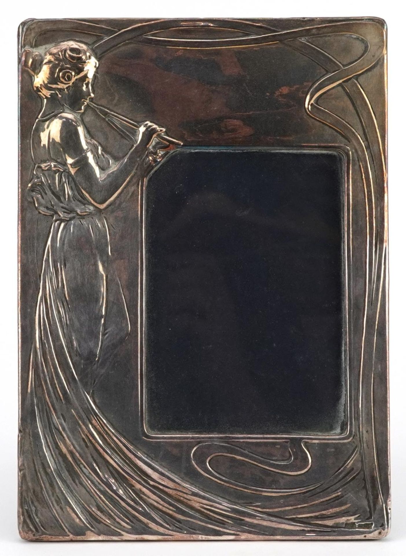 Elizabeth II rectangular silver easel photo frame embossed with an Art Nouveau female playing a
