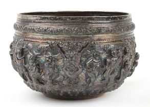 Burmese unmarked silver bowl profusely embossed with deities and animals within landscapes, 12cm