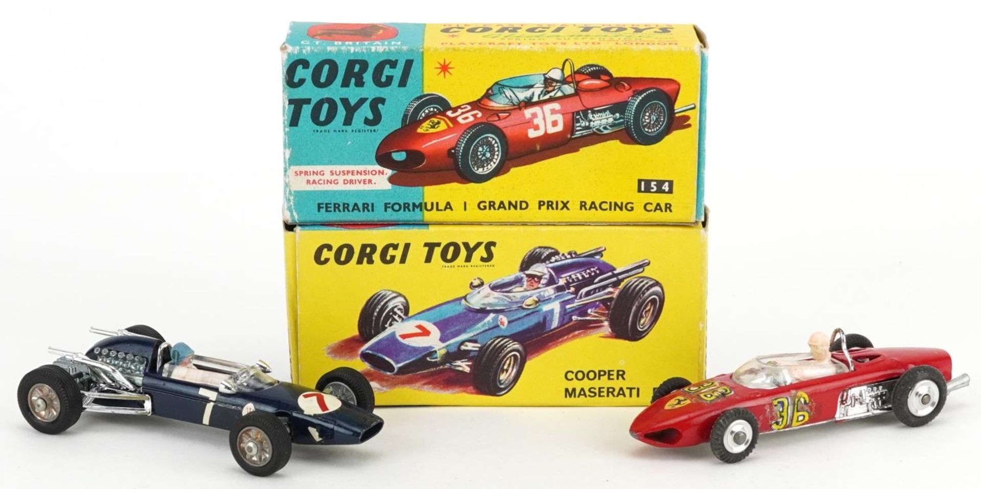 Two vintage Corgi Toys diecast racing vehicles with boxes comprising Ferrari Formula I Grand Prix