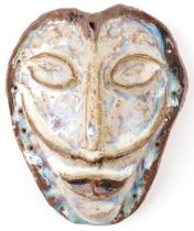 Mid century style grotesque pottery face mask, 20.5cm high