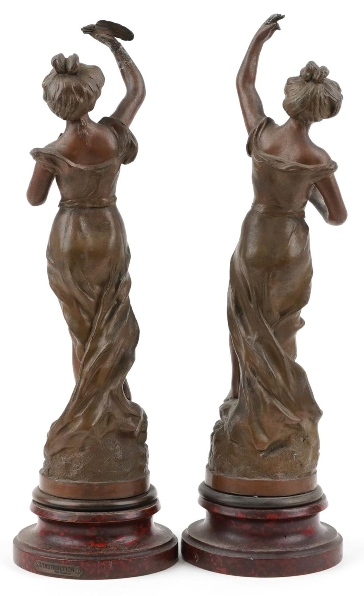 After Charles Ruchot, pair of classical French patinated spelter statues raised on faux rouge - Image 2 of 4