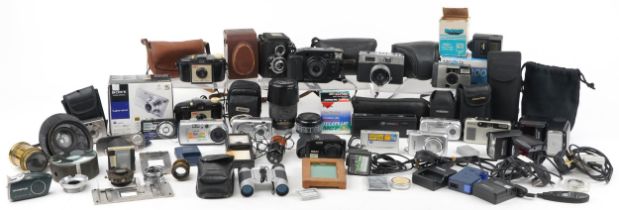 Vintage and later cameras, accessories and lenses including Kodak, Halina, Sony, Nikon, Olympus