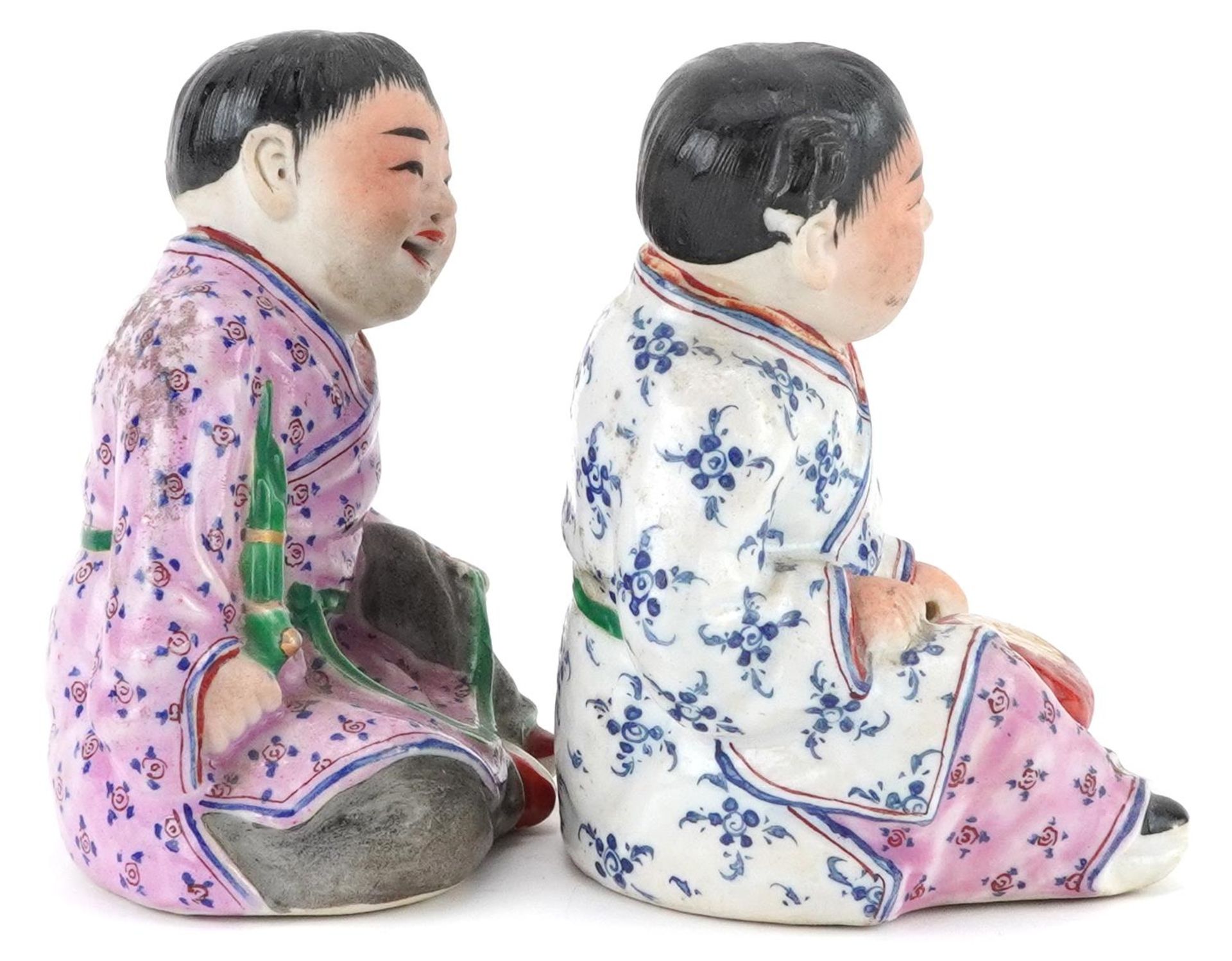 Pair of Chinese porcelain figures of children wearing robes, the largest 9.5cm high - Image 5 of 7