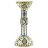 Turkish Ottoman Kutahya candle holder hand painted with stylised flowers, 29cm high