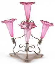 Victorian silver plated four branch epergne with cranberry glass liners, 28.5cm high