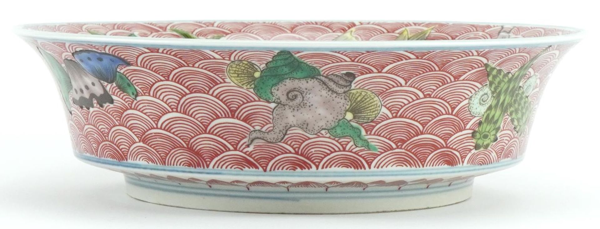 Chinese porcelain bowl hand painted in the famille verte palette with fish amongst crashing waves, - Image 3 of 7