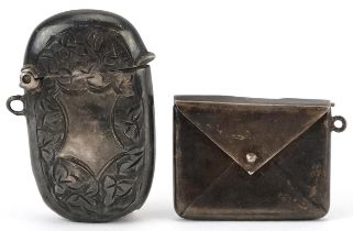 Edwardian silver floral engraved vesta and a stamp case in the form of an envelope, the largest