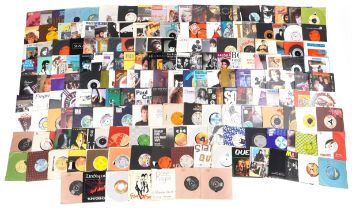 45rpm records arranged in four cases including Electric Light Orchestra, The Moody Blues, Neil