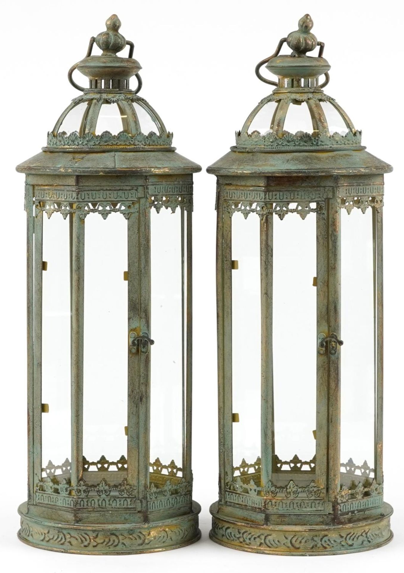 Pair of bronzed hanging lanterns with glass panels, 59cm high