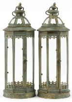 Pair of bronzed hanging lanterns with glass panels, 59cm high