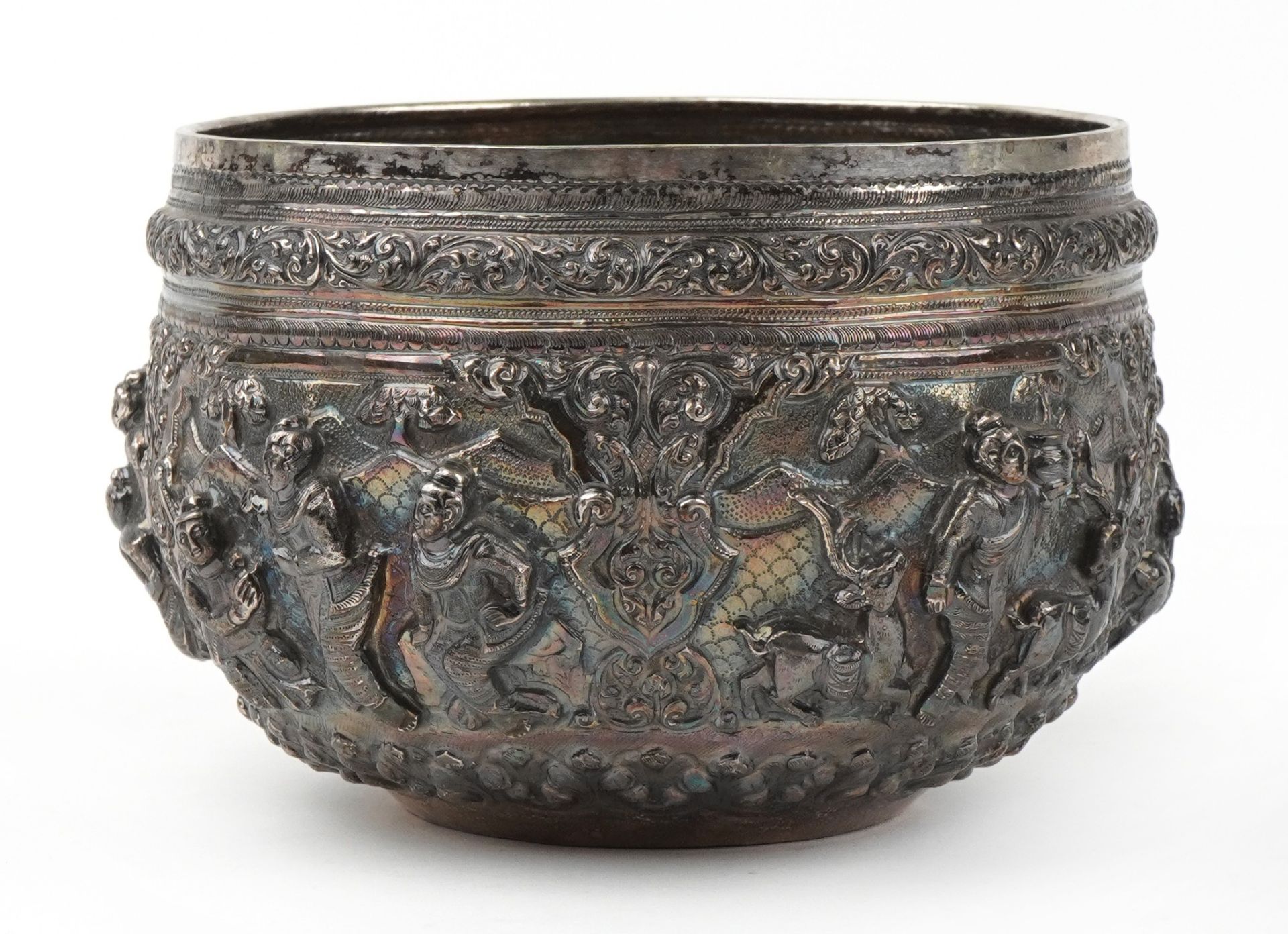 Burmese unmarked silver bowl profusely embossed with deities and animals within landscapes, 12cm - Image 4 of 10