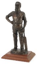 Neil Godfrey, cold cast bronze statue of a cricketer raised on a square mahogany base, overall