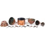18th/19th century and later kitchenalia including four copper funnels, jelly mould, saucepan and