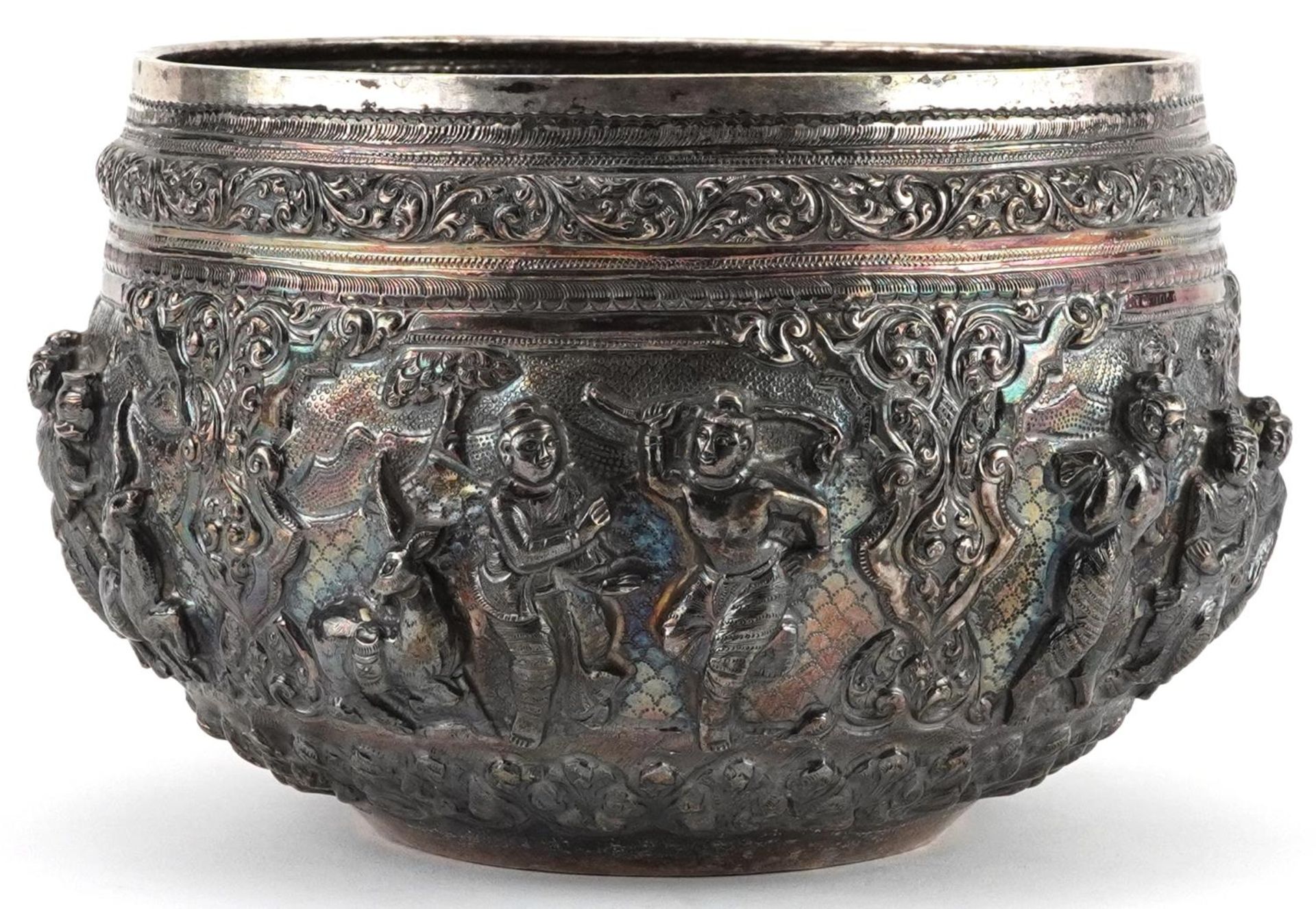 Burmese unmarked silver bowl profusely embossed with deities and animals within landscapes, 12cm - Image 7 of 10