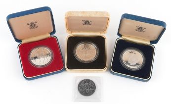 Three silver proof commemorative crowns by The Royal Mint and a 2013 Coronation half crown