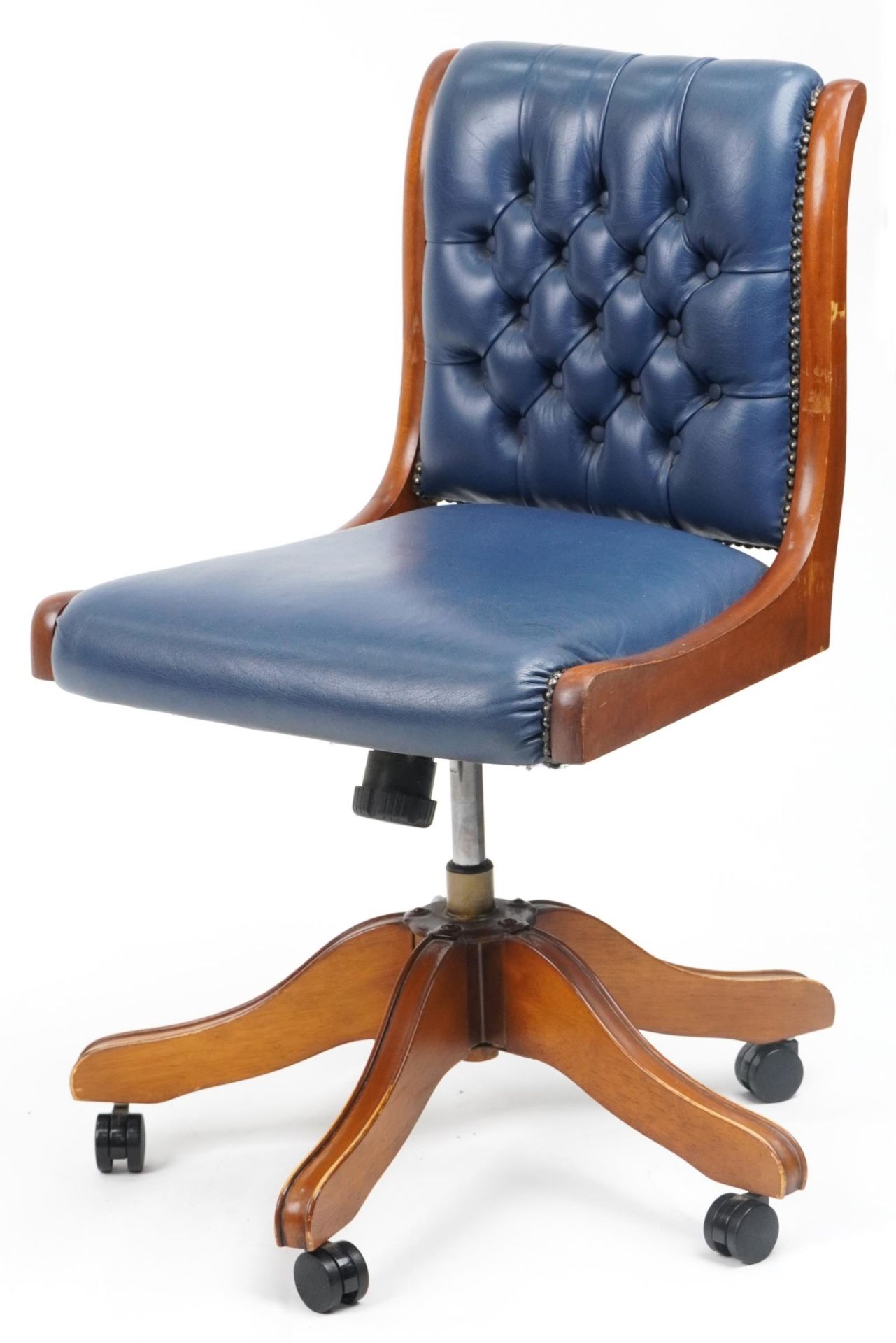 Mahogany and blue leather button back upholstered adjustable desk chair, 89cm high