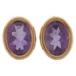 Pair of 9ct gold amethyst stud earrings, 9mm high, 1.1g