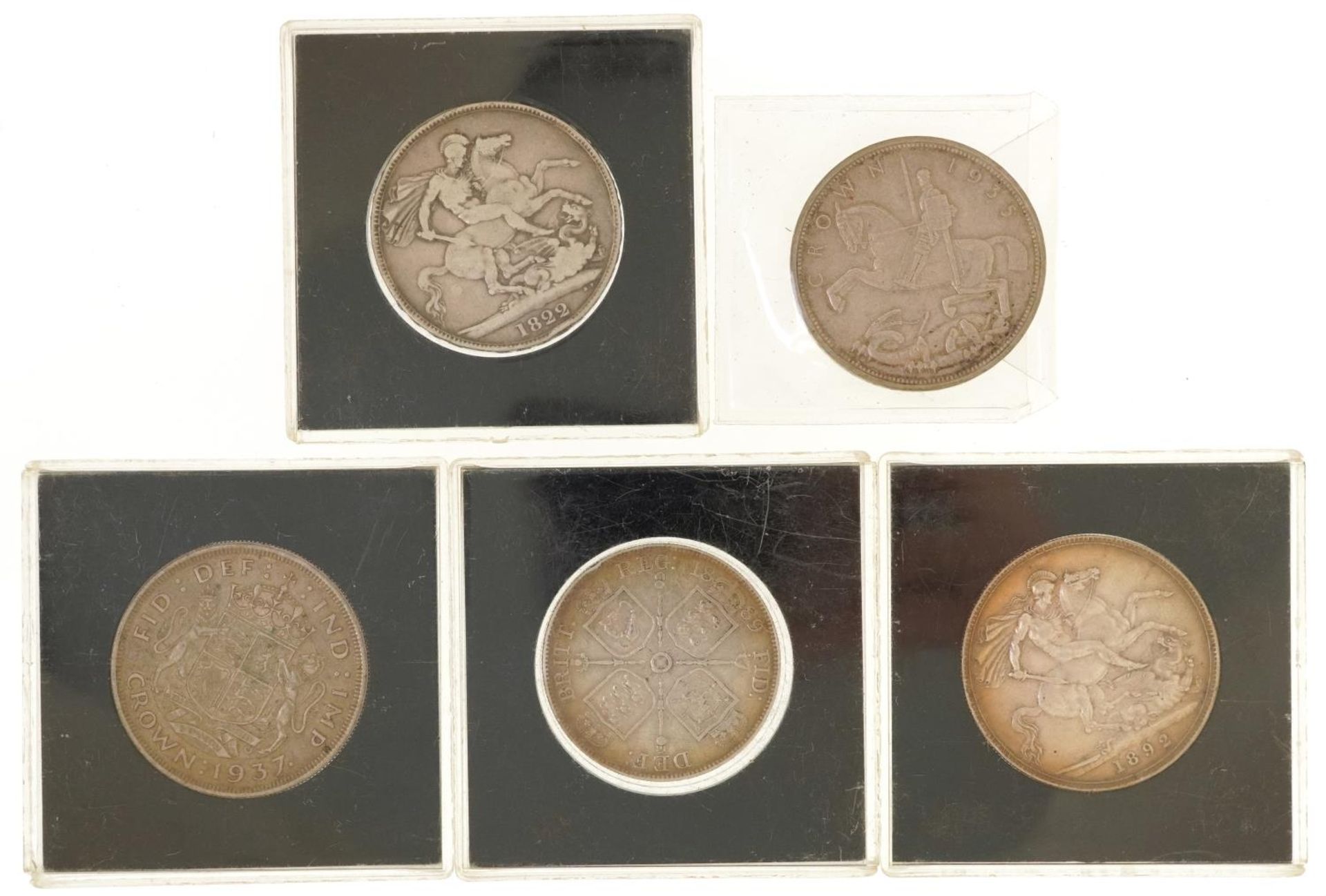 Four William IV and later crowns and a Queen Victoria 1889 double florin, the crowns comprising