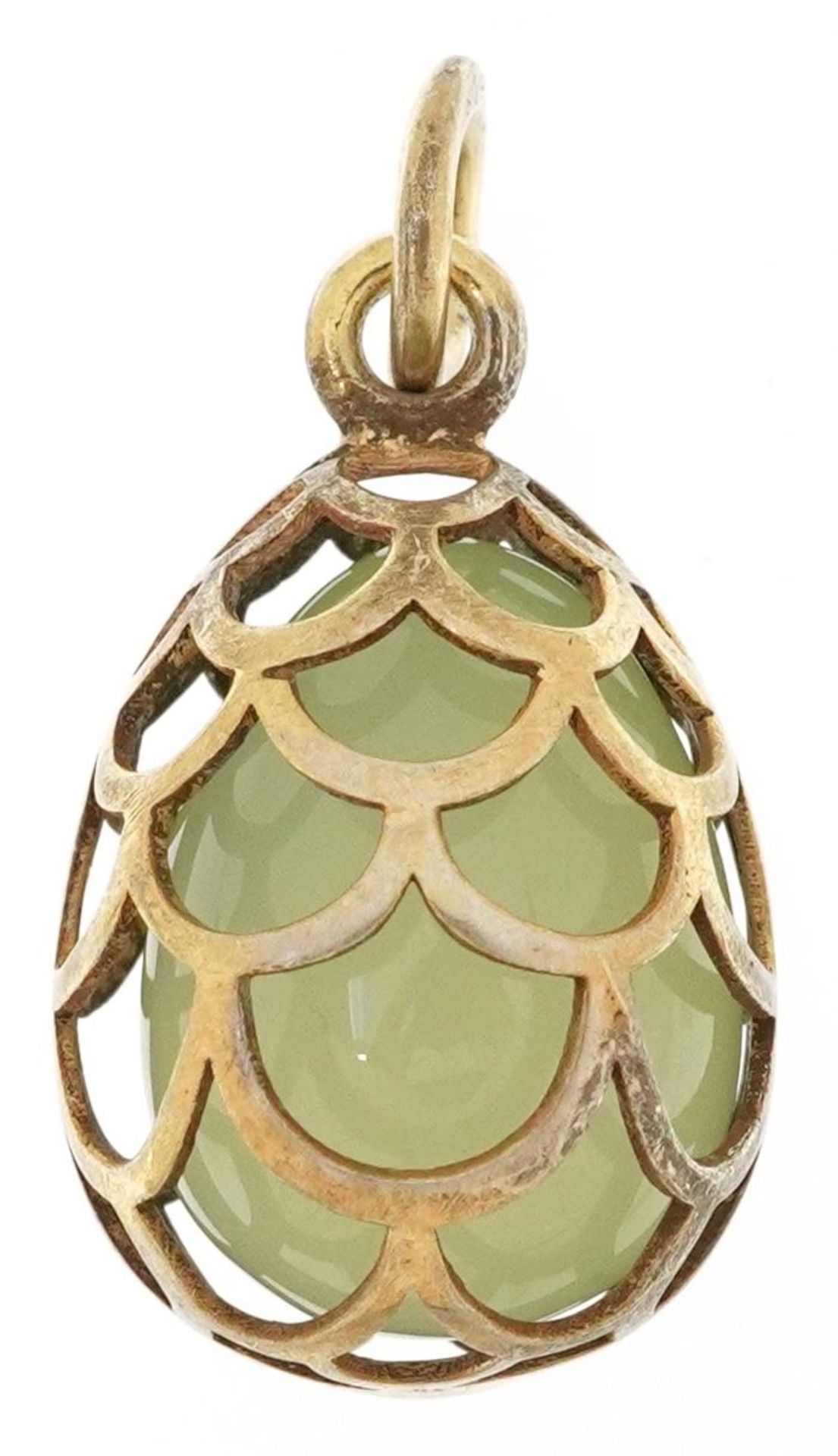 Silver gilt pierced cage pendant with enclosed green jade egg, impressed Russian marks to the