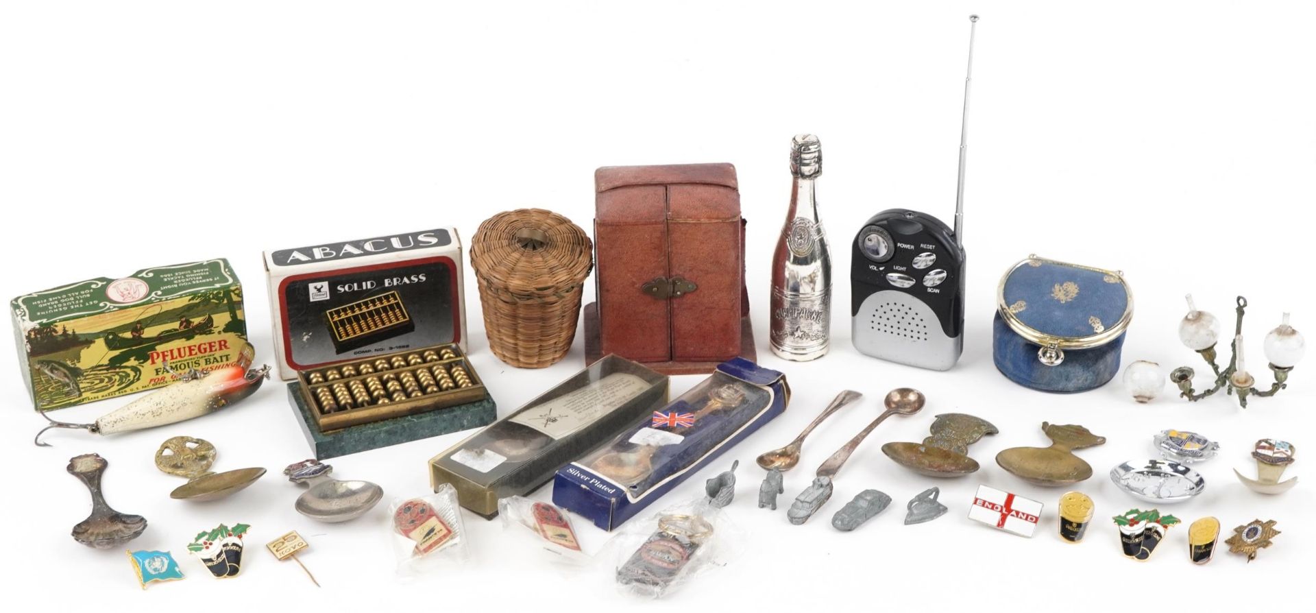 Sundry items including Guinness pin badges, caddy spoons and an alarm clock case