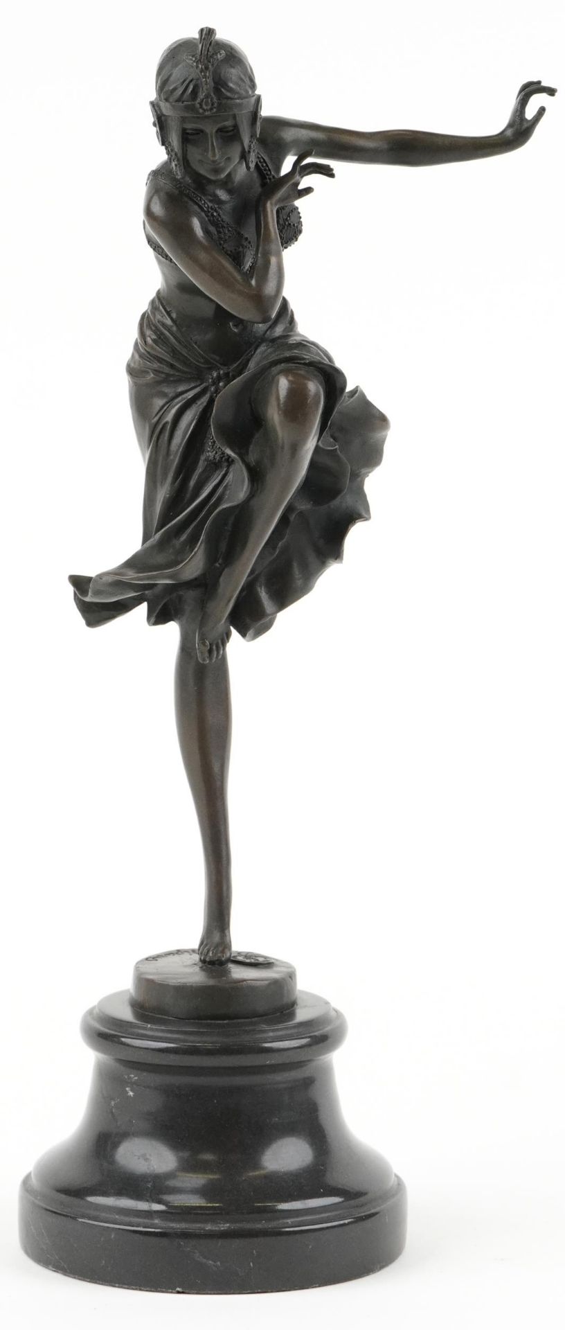 After Dimitri H Chiparus, patinated bronze statuette of an Art Deco female raised on a circular