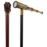 Two hardwood walking sticks including one with three draw brass telescope handle, the largest 92.5cm