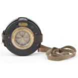 Early 20th century American Detex Newman security guard's watch clock with leather case, 15cm in