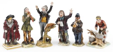 Six 19th century Neapolitan hand painted porcelain figures including five musicians, the largest