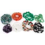 Eight crystal and semi precious stone necklaces including amethyst, carnelian and jade, the