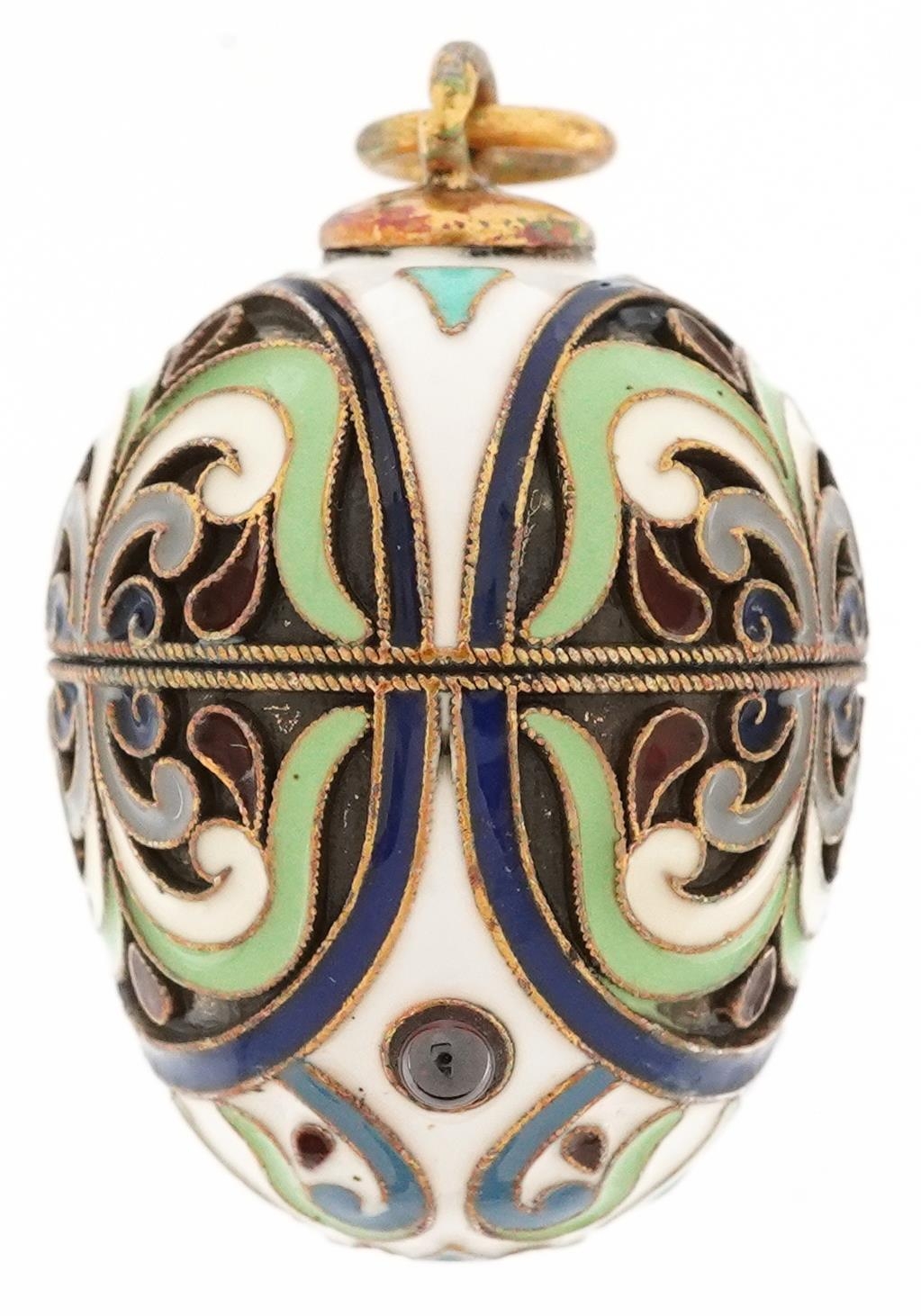 Silver gilt and enamel egg pendant set with garnet cabochons, impressed Russian marks to the - Image 2 of 3